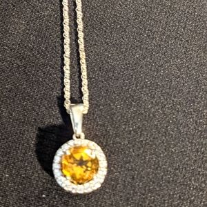 Citrine with white topaz pendant on 925 sterling silver necklace.